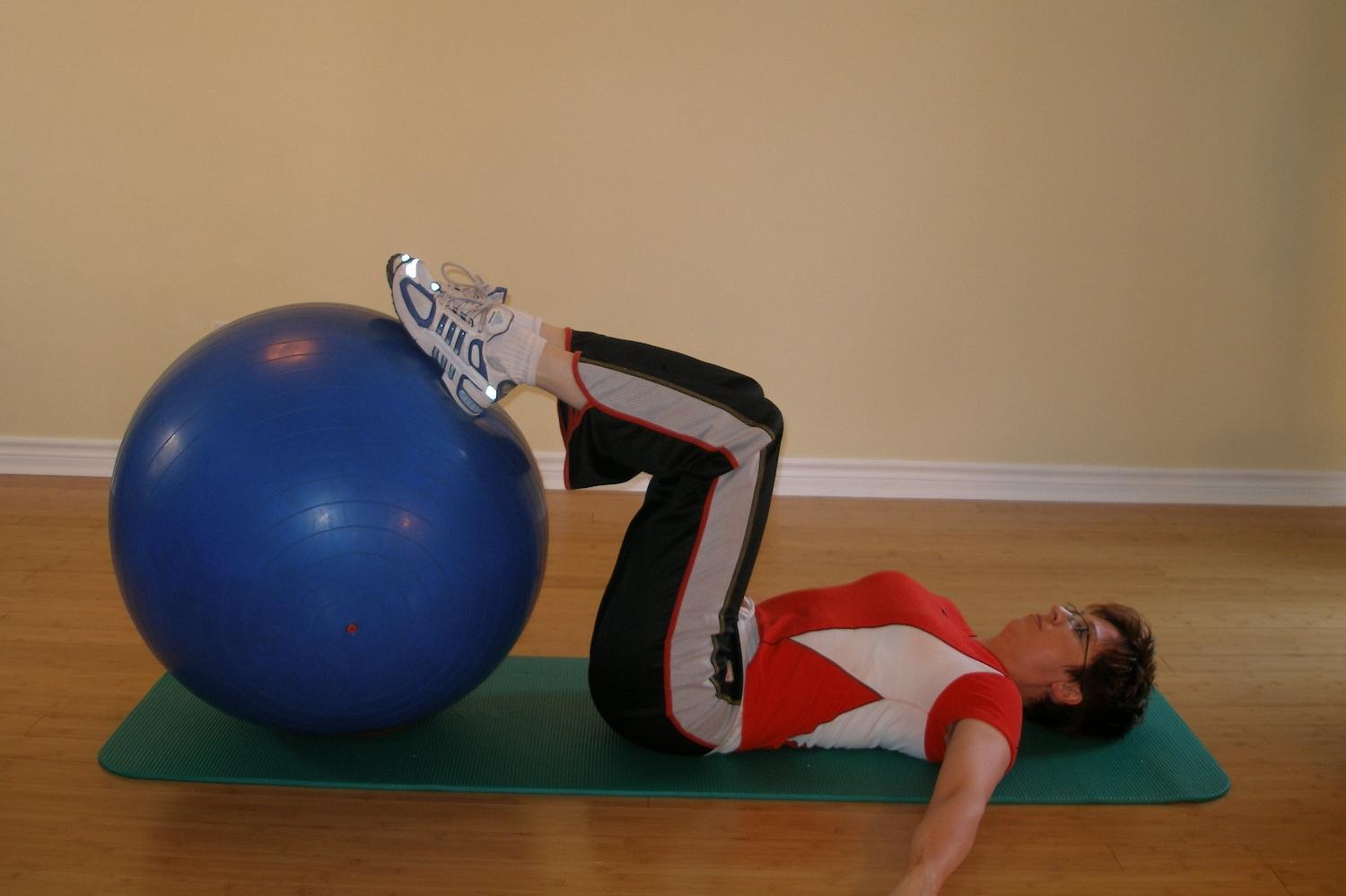 Exercise 5: supine lying knee drag to chest from neutral position with